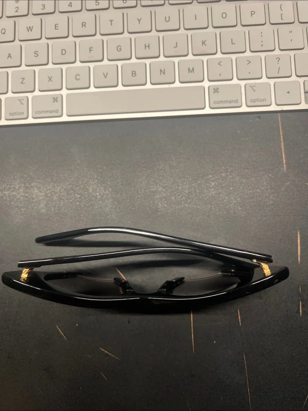 Miu Miu Black Cat-Eye Sunglasses with Gradient Lenses
